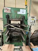 Molding press, capacity 236 tons.