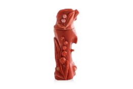 A CARVED CORAL SNUFF BOTTLE