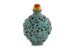 A TURQUOISE GLAZED RETICULATED PORCELAIN SNUFF BOTTLE