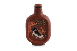 A YIXING STONEWARE 'PEKINGESE DOGS AND PIGEONS' SNUFF BOTTLE