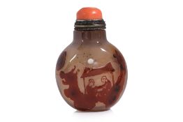 A CARVED CHALCEDONY SNUFF BOTTLE