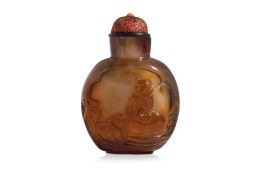 A CARVED AGATE 'WATER BUFFALO AND BOY' SNUFF BOTTLE