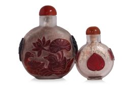 TWO OVERLAID GLASS SNUFF BOTTLES