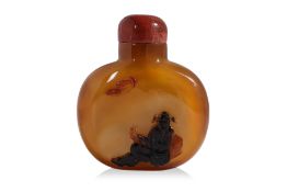 A CARVED CHALCEDONY SNUFF BOTTLE