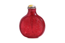 AN INSCRIBED RUBY-RED CARVED SNUFF BOTTLE