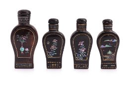 A GROUP OF FOUR LAC BURGAUTE SNUFF BOTTLES