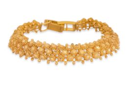 A HIGH KARAT GOLD BRACELET