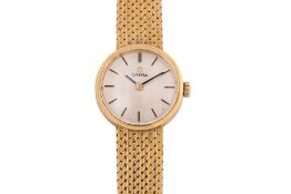 AN OMEGA LADY'S GOLD BRACELET WATCH