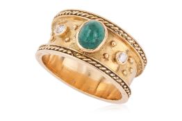 AN EMERALD AND DIAMOND RING