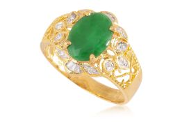 A HIGH KARAT GOLD JADEITE AND DIAMOND RING