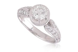 A DIAMOND 'MILGRAIN' RING BY LARRY JEWELRY