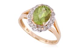 A PERIDOT AND DIAMOND 'HALO' RING