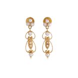 A PAIR OF CULTURED SEED PEARL AND HIGH KARAT GOLD EARRINGS