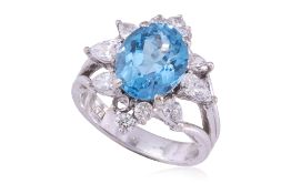 A TOPAZ AND DIAMOND RING