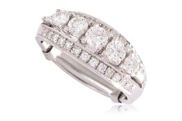 A THREE ROW DIAMOND RING