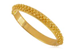 A HIGH KARAT GOLD BANGLE