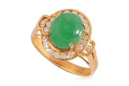 A TYPE A JADEITE AND DIAMOND HIGH KARAT GOLD RING