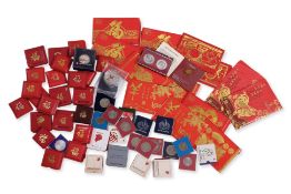 A LARGE GROUP OF MOSTLY SINGAPORE UNC COINS AND SETS