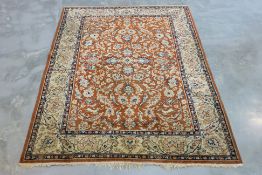 A PERSIAN DESIGN FOLIATE WOOL RUG (240 x 168cm)