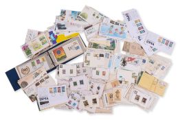 A GROUP OF FIRST DAY COVERS AND STAMPS