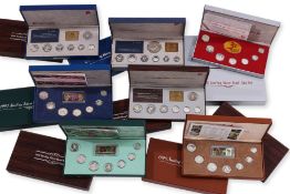 A GROUP OF 9 SINGAPORE STERLING SILVER PROOF COIN SETS