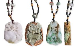 A GROUP OF FOUR JADEITE NECKLACES (1)