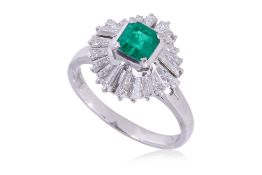AN EMERALD AND DIAMOND RING
