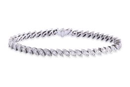A DIAMOND 'TENNIS' BRACELET