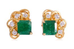 A PAIR OF EMERALD AND DIAMOND STUD EARRINGS