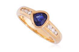 A HIGH KARAT GOLD SAPPHIRE AND DIAMOND RING
