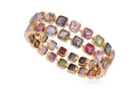 A PAIR OF MULTI GEMS SET BANGLE