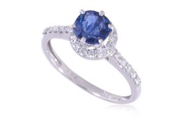 AN UNHEATED BURMESE SAPPHIRE AND DIAMOND RING