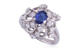 A SAPPHIRE AND DIAMOND RING