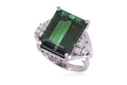 A GREEN TOURMALINE AND DIAMOND RING