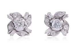 A PAIR OF DIAMOND 'WINDMILL' STUD EARRINGS