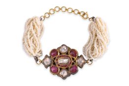 AN ANTIQUE INDIAN DIAMOND AND RUBY BRACELET