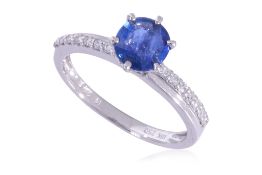 AN UNHEATED BURMESE SAPPHIRE AND DIAMOND RING