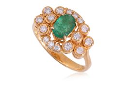 AN EMERALD AND DIAMOND RING