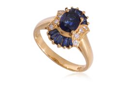 A HIGH KARAT GOLD SAPPHIRE AND DIAMOND RING