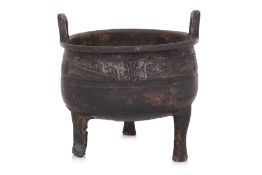 AN INSCRIBED BRONZE TRIPOD VESSEL, DING