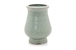 A CELADON GLAZED VASE