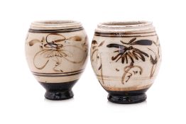 TWO CIZHOU WHITE-GLAZED AND PAINTED JARS
