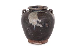 A LUSHAN PHOSPHATIC BLACK-GLAZED JAR
