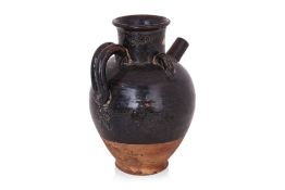 A LARGE BLACK GLAZED EWER