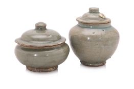 TWO LONGQUAN CELADON JARS AND COVERS