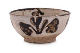 A WHITE-GLAZED BLACK SPLASHED BOWL