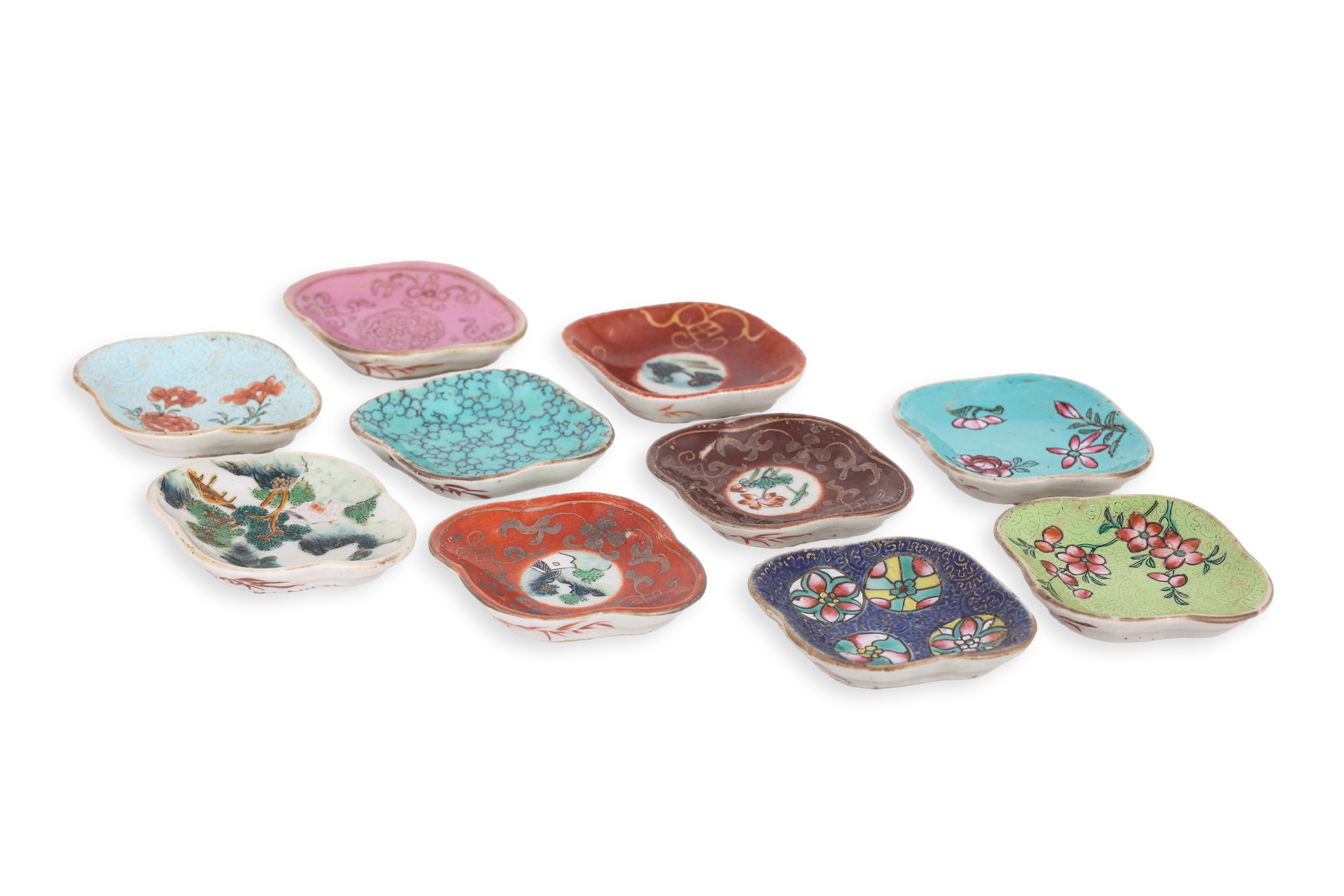A GROUP OF TEN ENAMEL DECORATED PORCELAIN SAUCE DISHES