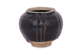 A HENAN BLACK-GLAZED RIBBED JAR