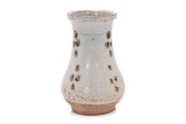A SMALL IRON-SPOTTED QINGBAI VASE