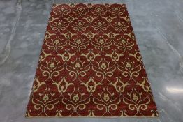 A CONTEMPORARY FOLIATE WOOL RUG (244 x 150cm)